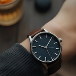 a person showing the beauty of Slim watches