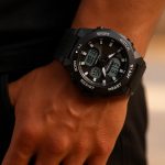 black Sporty watches worn and complementing the black style of the the person wearing.