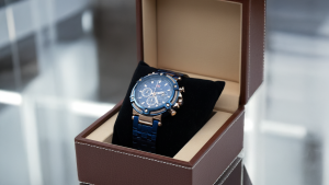 a luxury watch is shown on inside the watch box