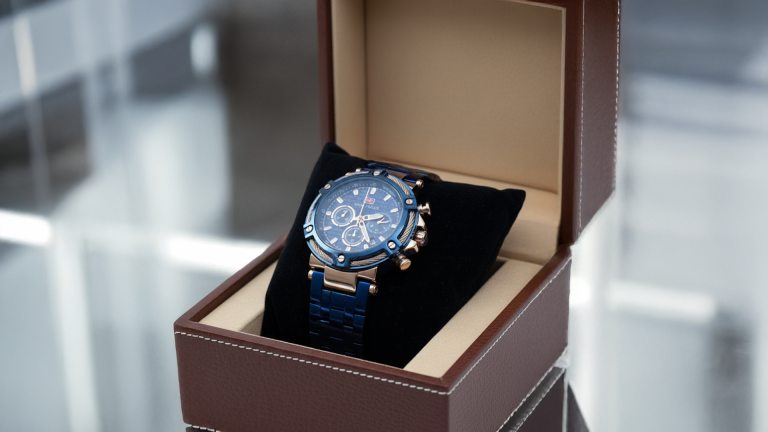a luxury watch is shown on inside the watch box